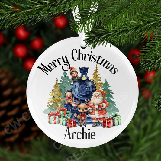 A christmas decoration with train, santa, ellves and presents with words Merry Christmas personalised with a childs name