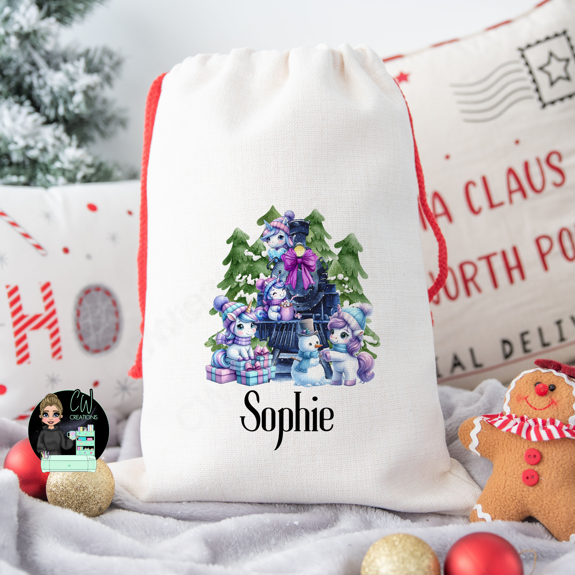 A linen Christmas sack with a Unicorn train personalised with a name.