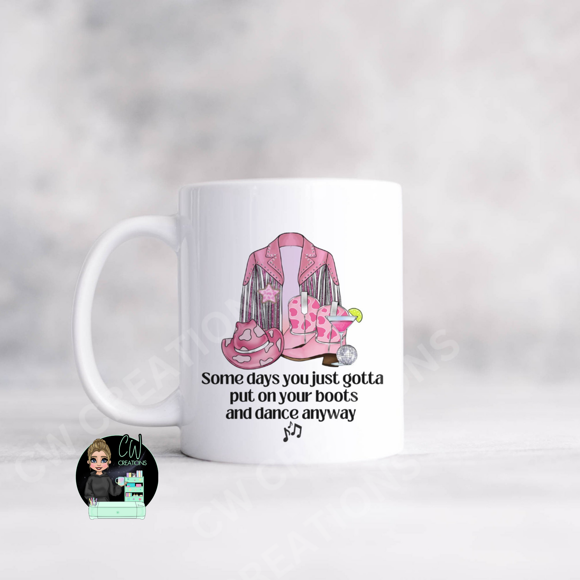  A cowgirl mug featuring a quote saying some days you just gotta put your boots on and dance anyway.