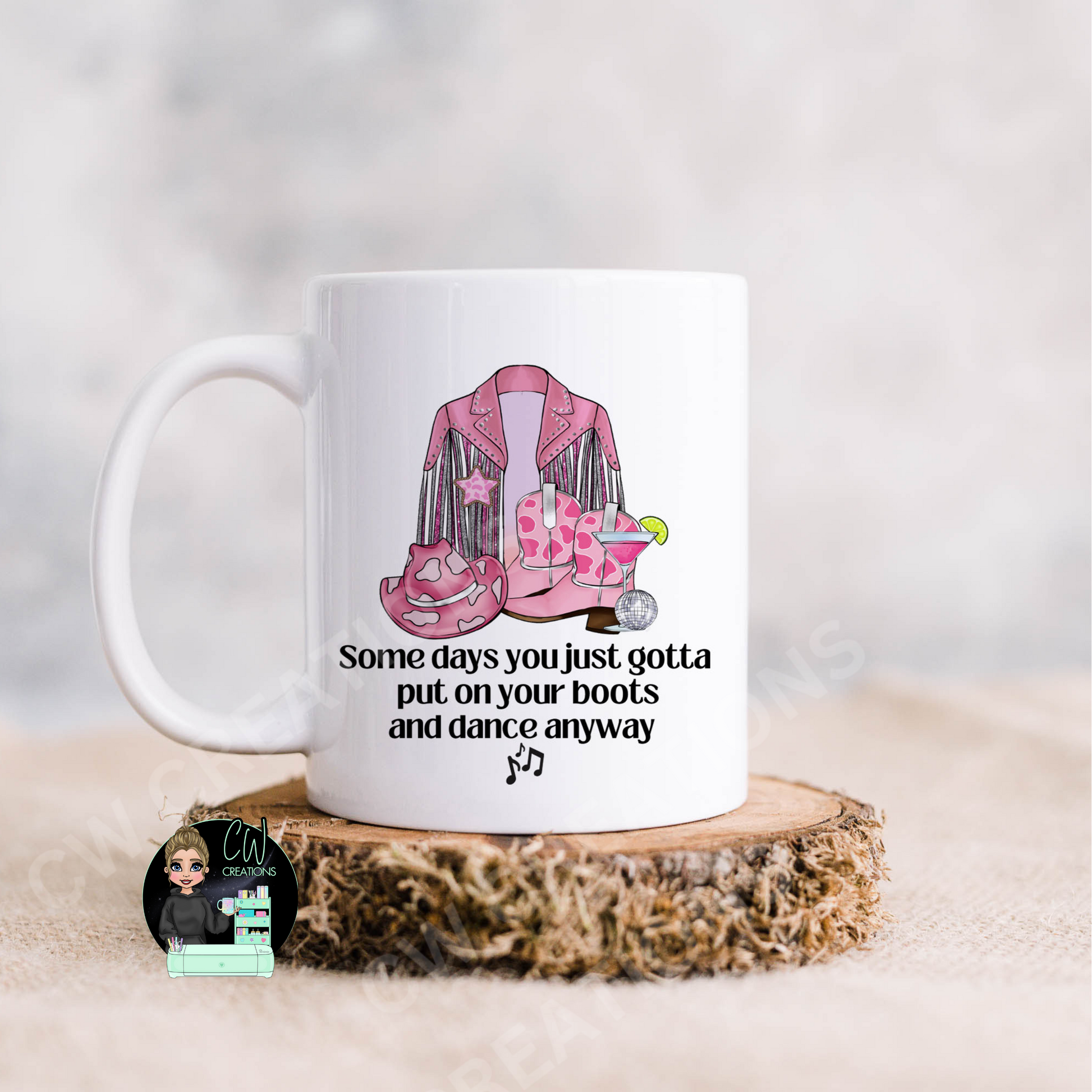  A cowgirl mug featuring a quote saying some days you just gotta put your boots on and dance anyway.