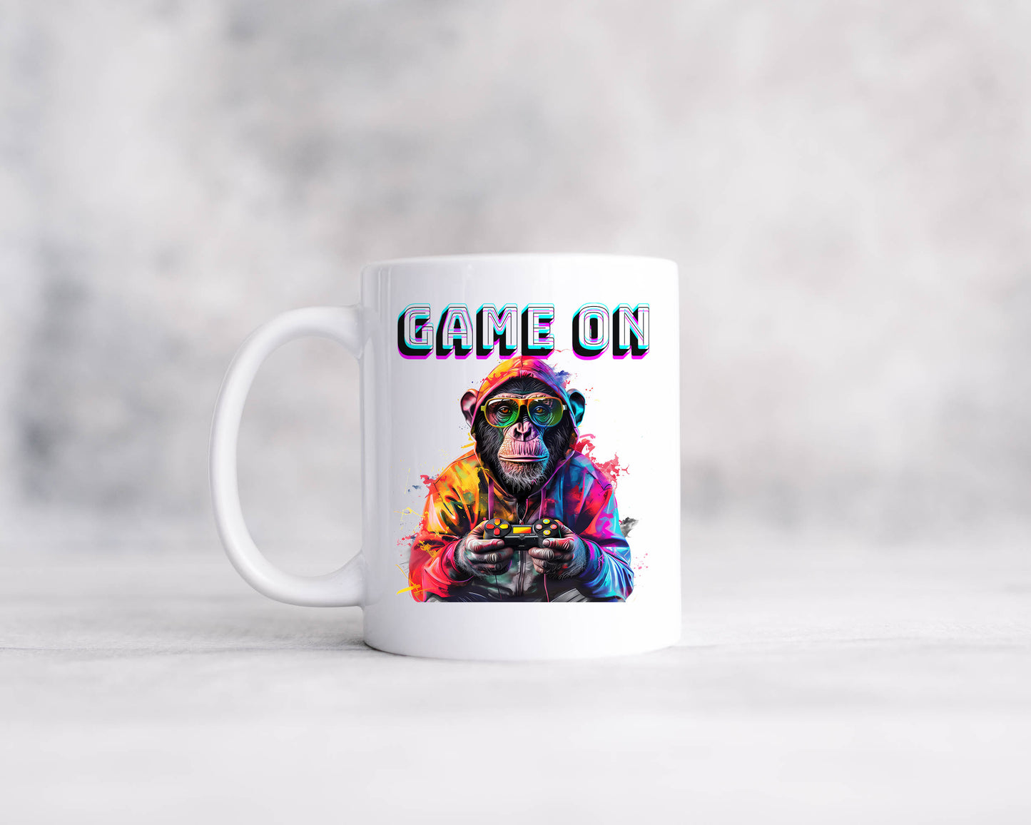 A white mug with the words Game On featuring a mug holding a controller.