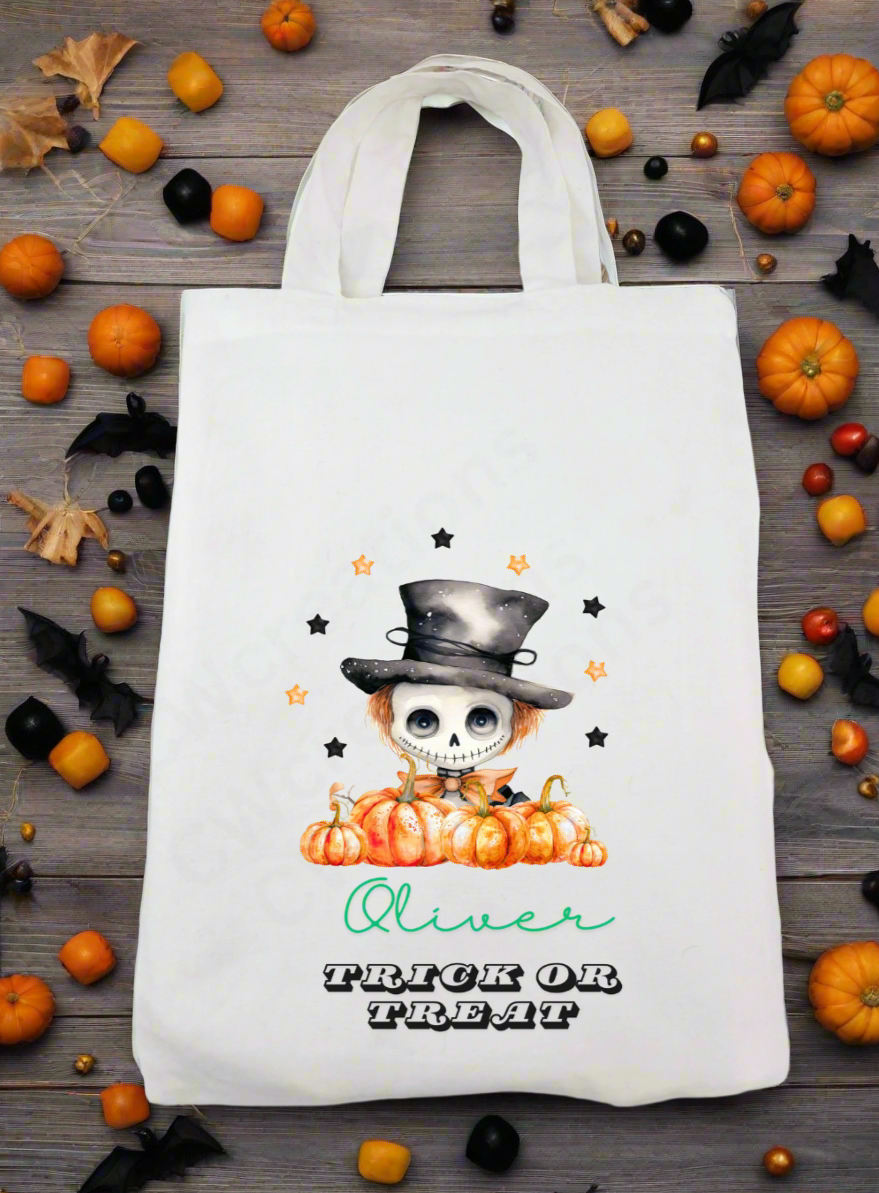 A white bag with a skeleton pumpkin and stars personalised with a child name.