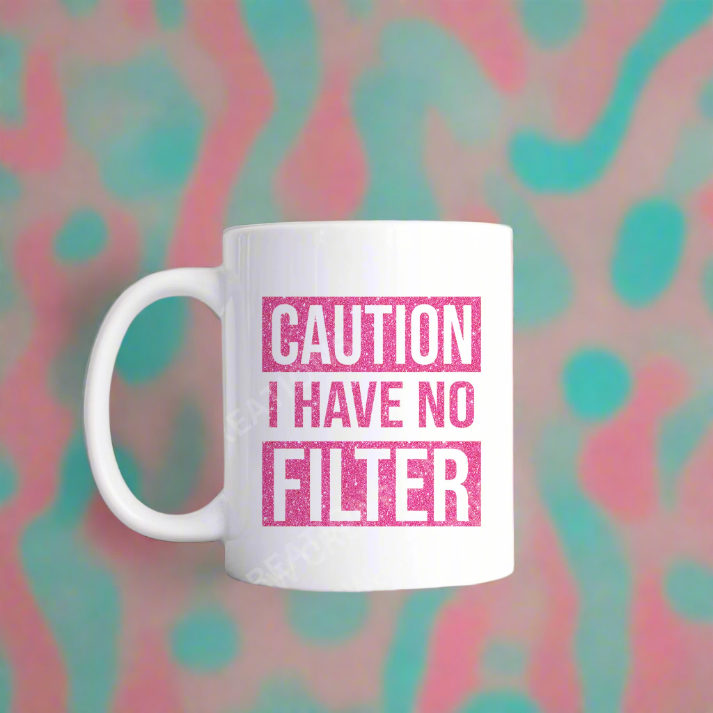 A coffee mug with the phrase "Caution: I Have No Filter" printed on it, emphasizing a bold and humorous attitude