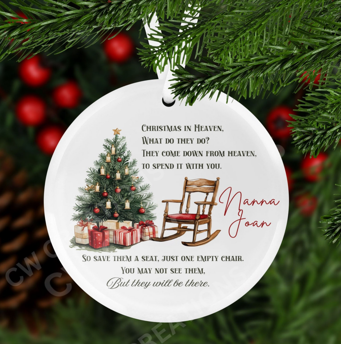 A Christmas ornament featuring a tree and rocking chair, symbolizing a heavenly memorial for loved ones during the holidays