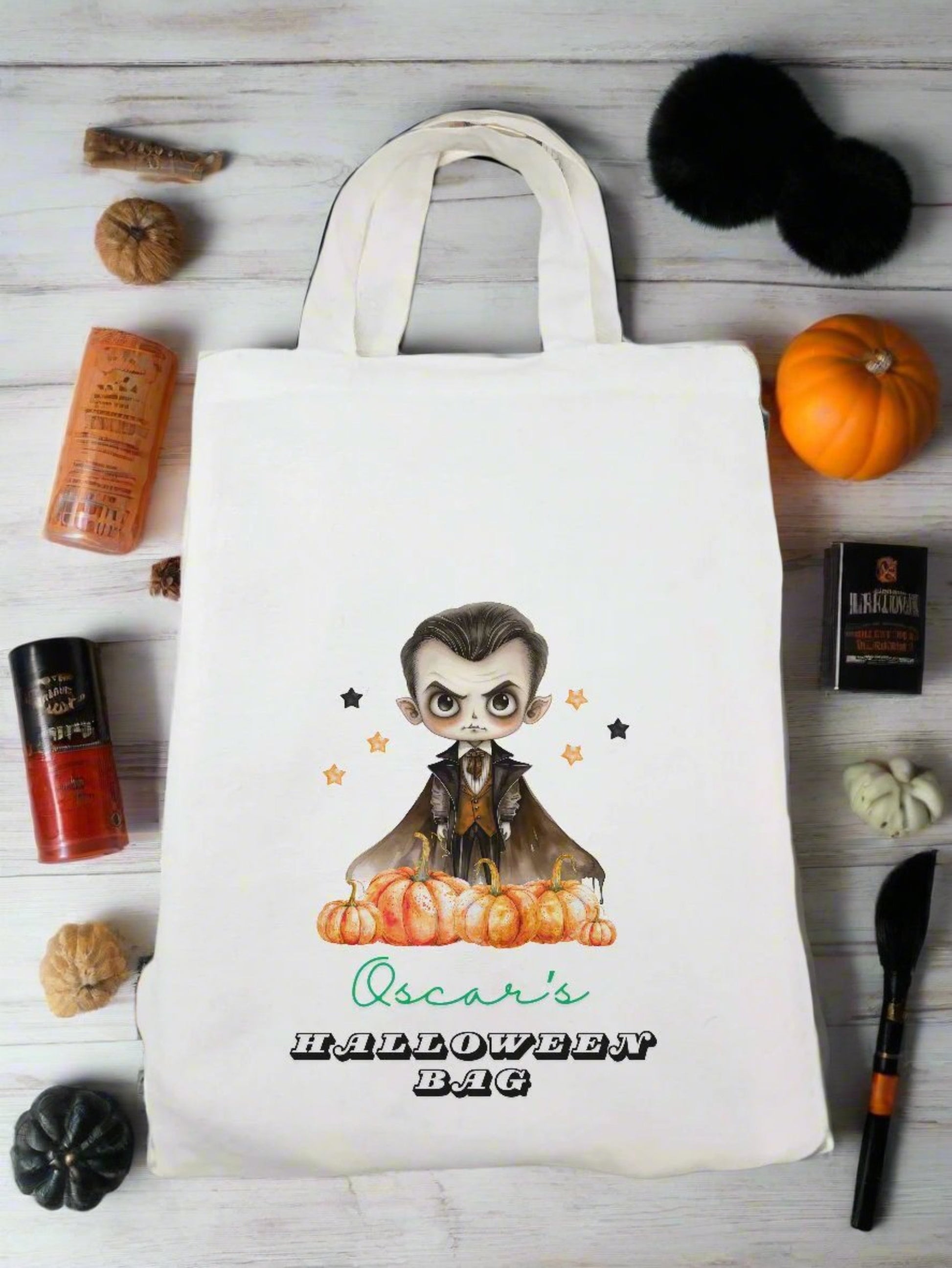 A Halloween-themed tote bag featuring a playful cartoon character, perfect for festive outings and trick-or-treating